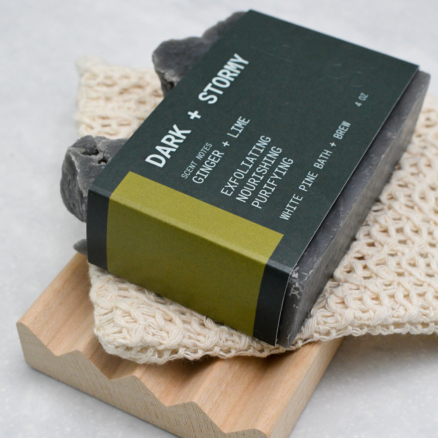 Dark + Stormy beer soap set including bar of soap, soap saver bag, and wooden soap dish