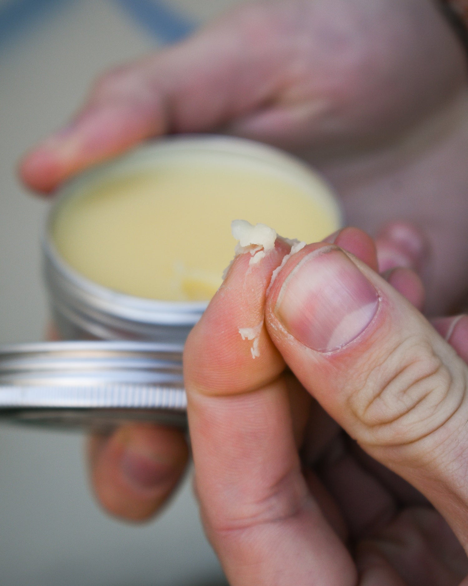 fingers using beard balm
