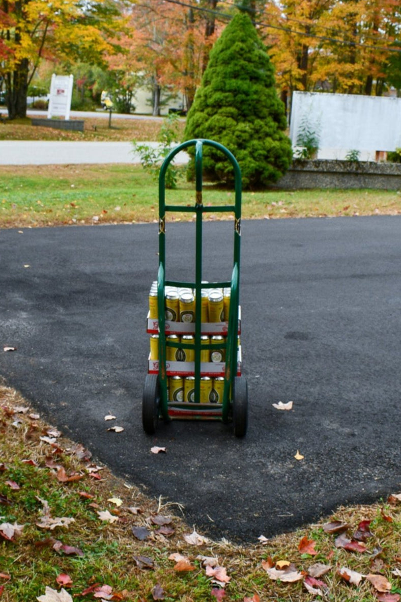 3 cases of Geary's Brewing Co beer on a dolly
