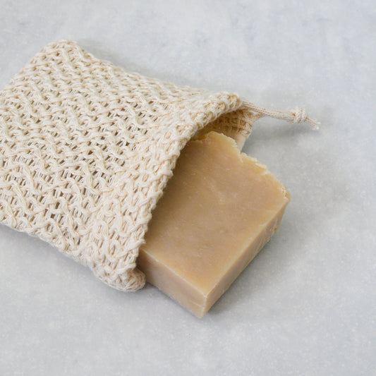cocoa butter bar of beer soap in soap saver bag