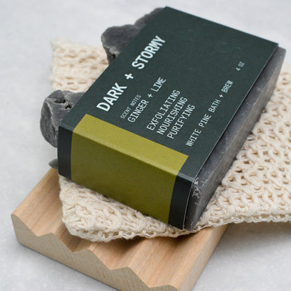 Dark + Stormy beer soap set including bar of soap, soap saver bag, and wooden soap dish