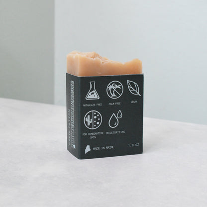 Mini bar of Greenwarden beer soap from the back stating on the label that it is: phthalate free, palm free, vegan, for combination skin, and moisturizing, made in maine
