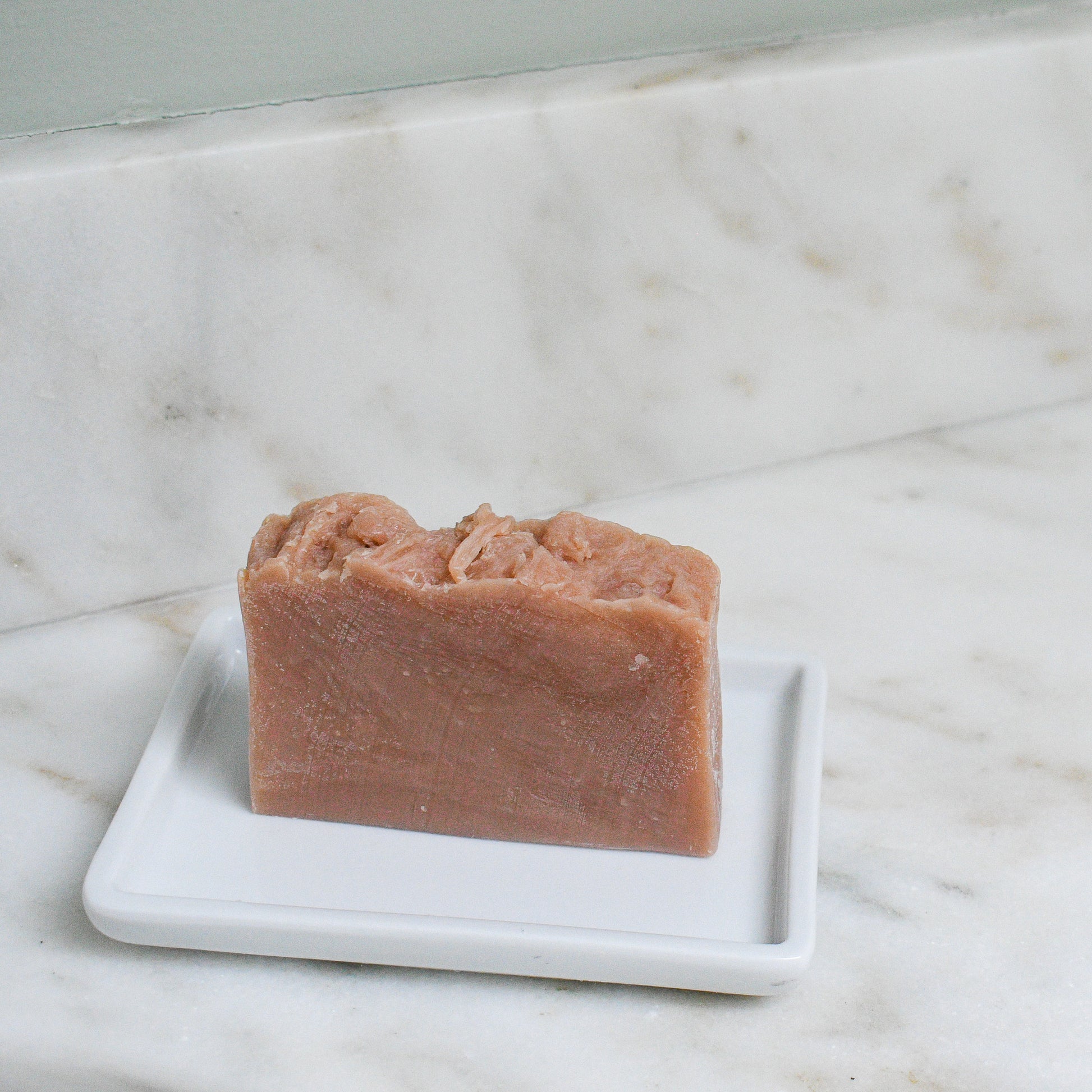 Kettle Rose beer soap on a ceramic soap dish