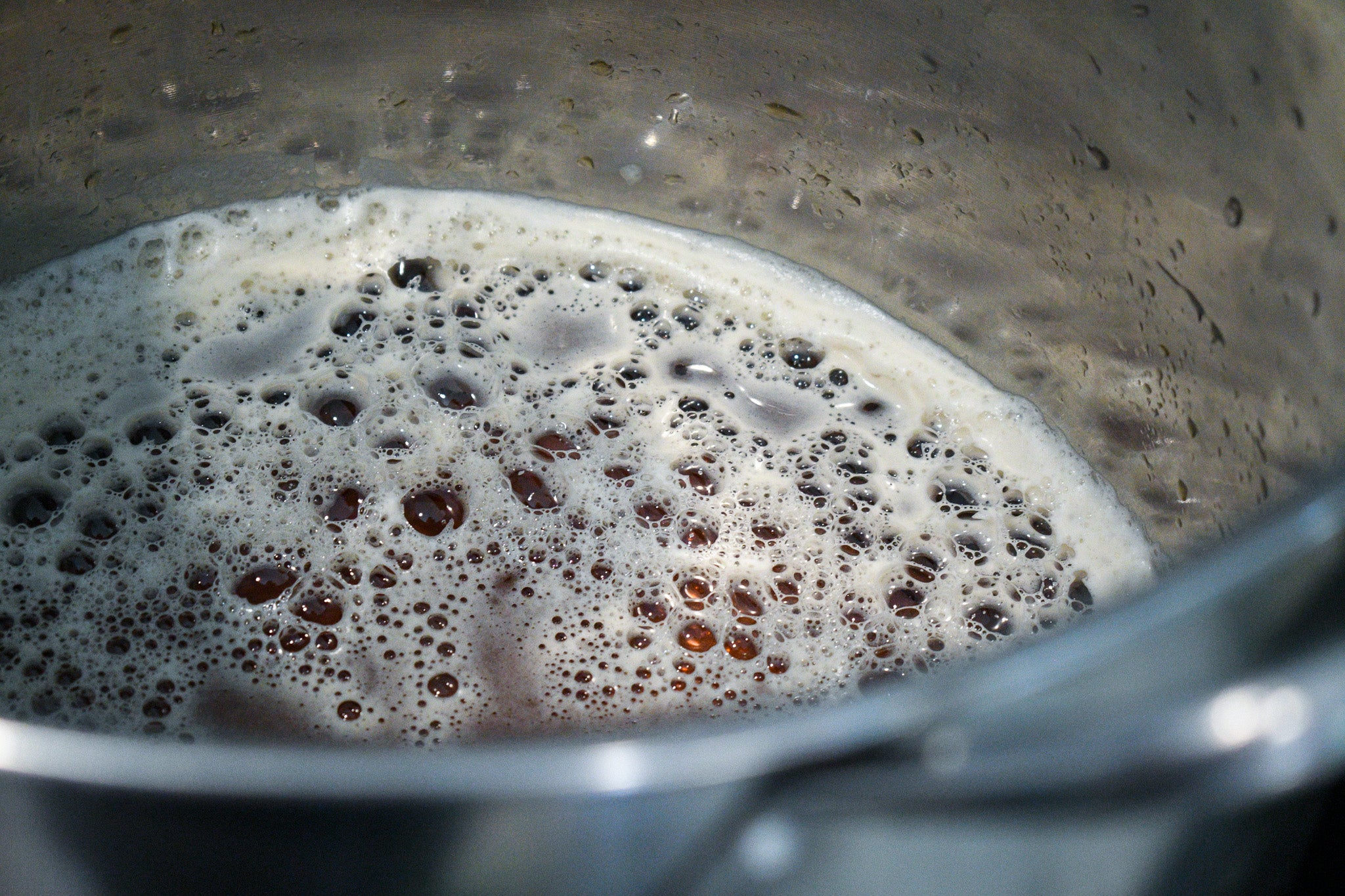 beer being boiled in a pot